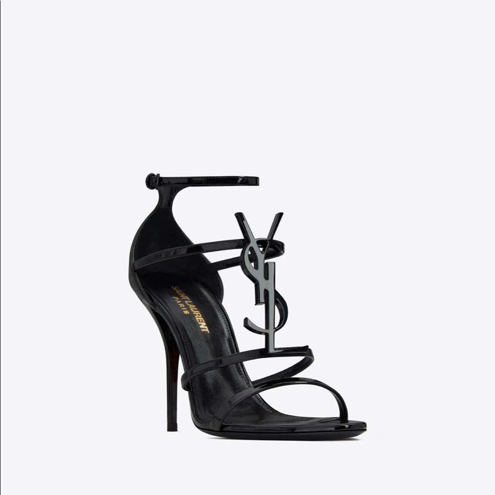 Saint Laurent: CASSANDRA SANDALS IN PATENT LEATHER WITH BLACK MONOGRAM